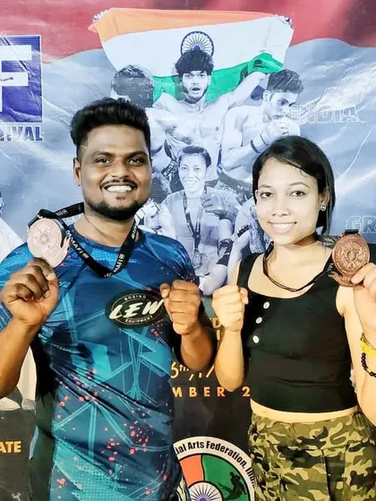 My student Anwesha and I proudly display our bronze medals from the MMA National Federation Championship 2022. It is a special feeling to win alongside your student.