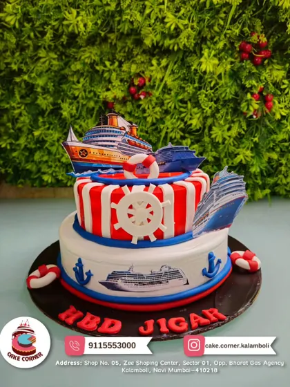 Set sail for a fun birthday with this two-tier nautical ship cake for Jigar. The anchors, lifebuoys, and cruise ships make it perfect for a sea-loving adventurer.