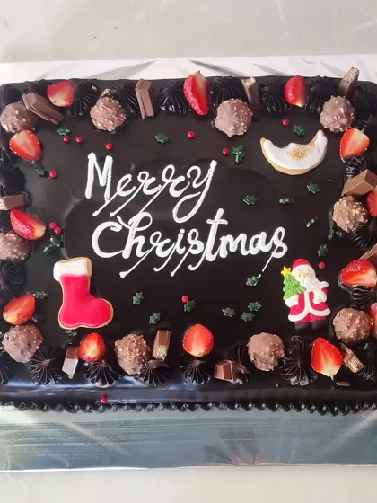 Another large chocolate cake for a corporate Christmas party. We can handle large orders to make your office celebrations sweet.