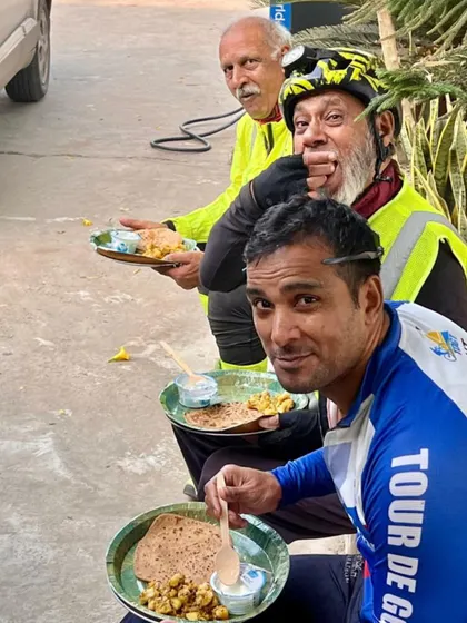Enjoying a simple, nutritious meal on the roadside. This is the reality of ultra-endurance cycling.