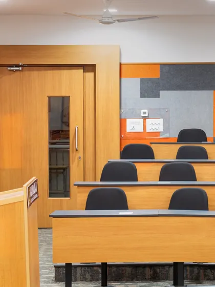A close-up of the tiered seating and acoustic wall panels at GL Bajaj University. Every element is planned to create an immersive setting where learning can thrive.
