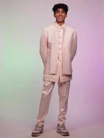 A smiling shot in the pink Indo-western set. This outfit is not just stylish, it's also fun to wear.