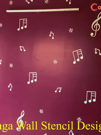 This wall features our 'Raga' stencil design, with musical notes scattered across a deep magenta background. It's a creative and personalized choice for a music lover's room or a creative studio space.