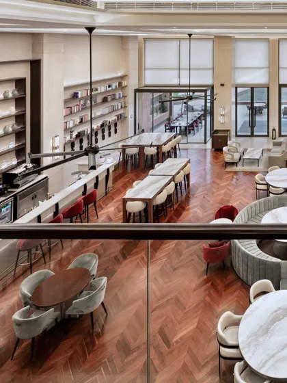 From this upper-level vantage point at the Elevate Clubhouse, the strategic flow of the space is clear. The layout connects the bar, various dining sections, and lounge areas, encouraging movement and interaction while maintaining a cohesive and open atmosphere.
