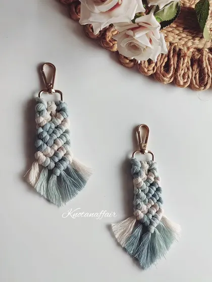 A lovely combination of pastel blue and off-white for these macrame keychains. The fishtail braid pattern is one of my favorites to make.