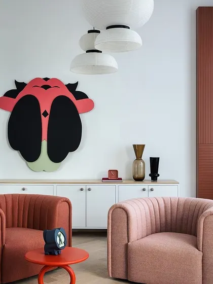 What could be more luxurious than a nice sofa? This image showcases how we can help you select the perfect furniture, like these stylish accent chairs, to create a comfortable and chic living space.