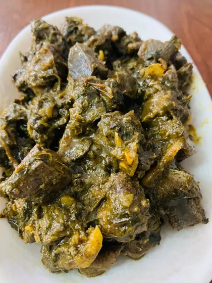 This is my special beef liver pickle, cooked with its own gallbladder for a unique bitter taste that many Nagas love. I prepare it with dried king chillies, bamboo shoot juice, and dried yam leaves for an earthy flavour.