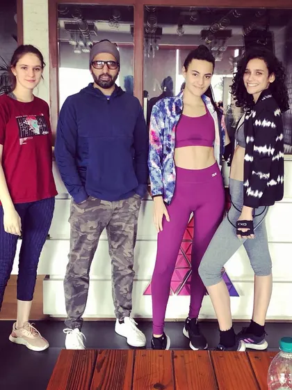 A group photo with some of our international clients. Fitness is a universal language, and our studio is a welcoming space for people from all over the world.