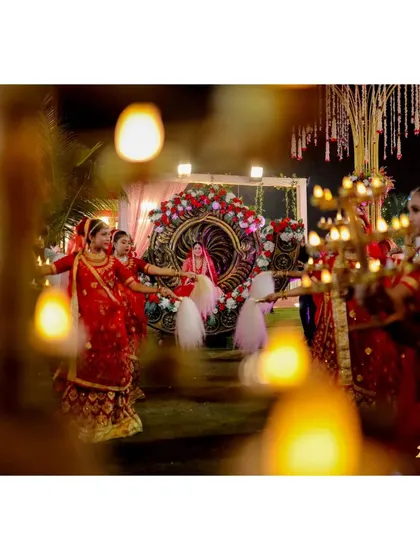 The bride's unique entrance in a beautifully decorated doli, a truly memorable moment.