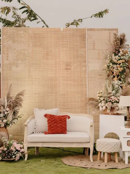 Another view of the rustic photo booth, with a mix of textures and neutral tones.