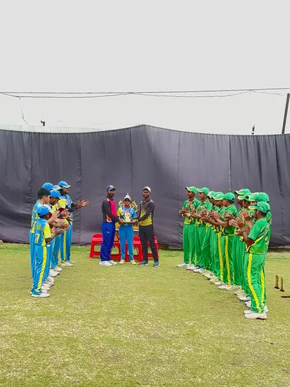 The winning team, Future Blasters, receiving their trophy.