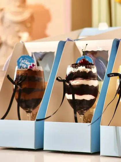 Our Father's Day dessert glasses, elegantly packed in individual boxes, ready for gifting.