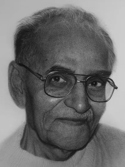 A memorial portrait of an elderly gentleman with glasses. Capturing a likeness that feels both accurate and alive is key for these special pieces.
