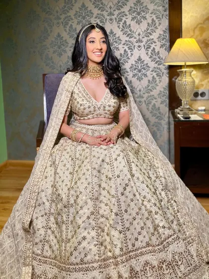 Another angle of this breathtakingly luxe look. The skin is flawless, the eyes are softly defined, and the overall effect is one of pure elegance.