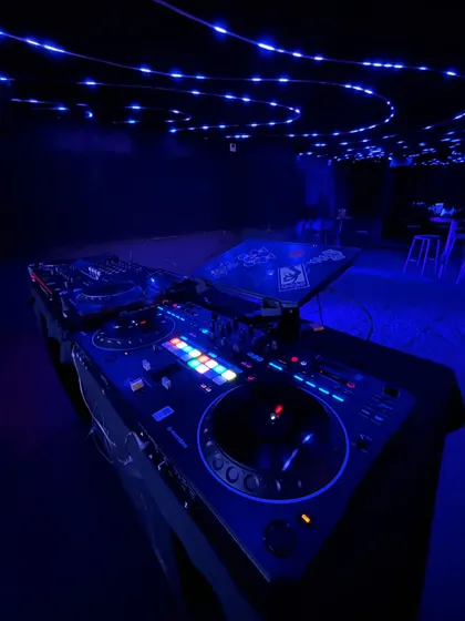 The calm before the storm. A shot of my DJ setup under the cool blue lights of the club, ready for the 'Back to the Future' themed party.