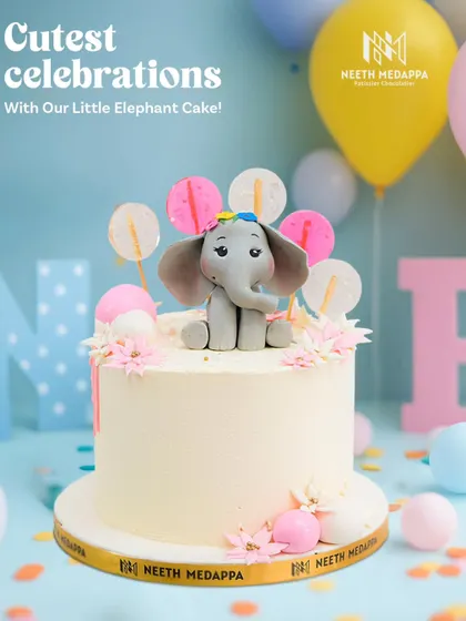 The cutest celebrations with our little elephant cake! This design features a sweet elephant topper surrounded by lollipops and pastel details.