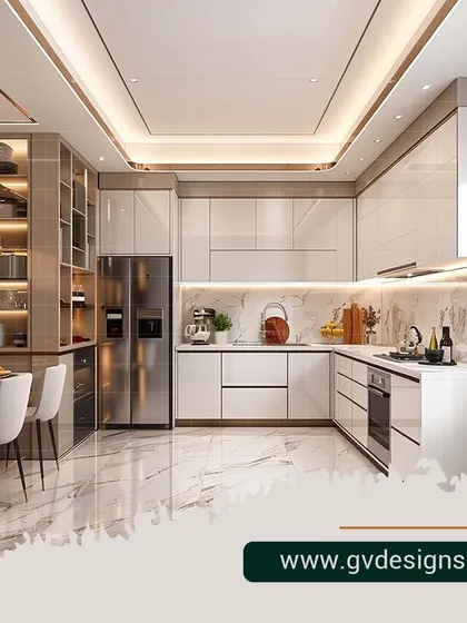 This is the kitchen of your dreams, where high-end style meets everyday function. We designed this open-concept space with sleek, handleless cabinetry, integrated appliances, and luxurious marble flooring, all illuminated by layered cove and accent lighting to create an atmosphere of modern opulence.