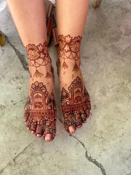 Another angle of the beautiful bridal feet, showing the rich color and intricate details.