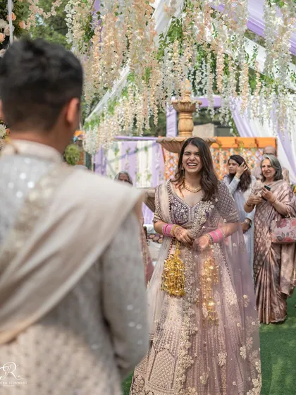 A candid shot of the bride's first look, her smile says it all. This was from a beautiful, small wedding in Delhi.