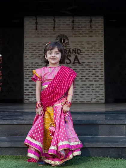 A lovely portrait of a young girl dressed for a cultural event. I make sure to capture the beauty and detail of special occasion outfits.