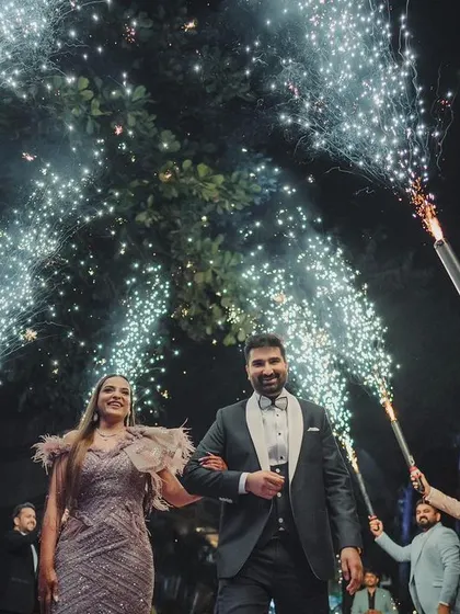 Making a grand entrance to your new life together. I orchestrate spectacular couple entries with dramatic elements like cold pyro, ensuring your arrival is as memorable as the ceremony itself.