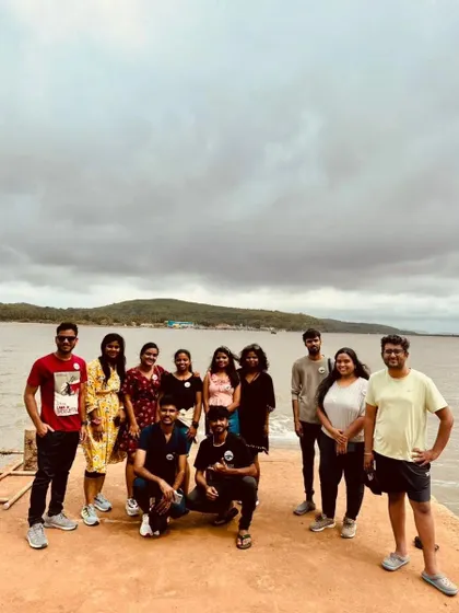 A group photo on the pier, with the calm backwaters behind us.