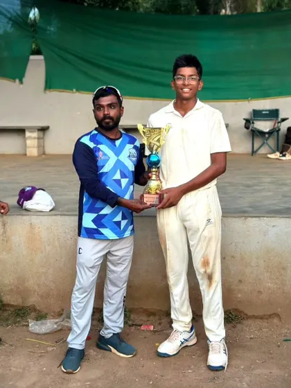 A proud moment for our U-16 player, holding the Inspirational Cup trophy high.