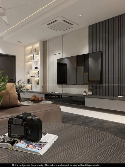 A wide view of a living room, showing how the TV unit, coffee table, and sofa work together to create a cohesive and inviting space. The back-lit open shelving provides a perfect spot for decor.