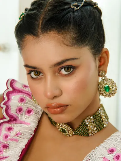 A close-up of a finished glam look, focusing on flawless skin, defined eyes, and perfectly blended tones. In my masterclass, we dive deep into the techniques required to achieve this level of professional, photo-ready makeup.