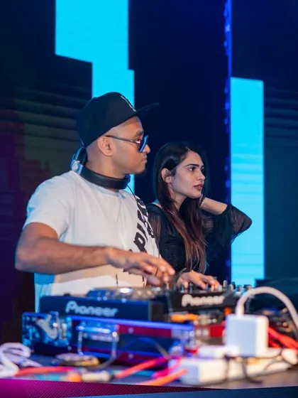 Sharing the console with another DJ at the Kaavaalaa festival. The spirit of collaboration and shared passion for music is strong in the festival community.