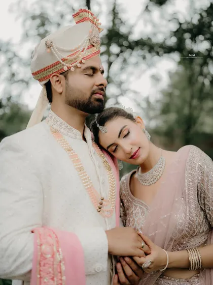A moment of quiet connection and peace. This close-up captures the couple with their eyes closed, lost in the feeling of being together.