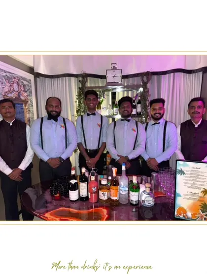 Our team in stylish suspenders and bow ties, ready for a themed event. We ensure our attire matches the client's vision.