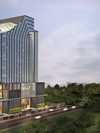 An angled view of the Pullman Hotel, showcasing its dynamic, sculpted form. This bold statement in hospitality architecture is crafted for luxury, experience, and timeless appeal.