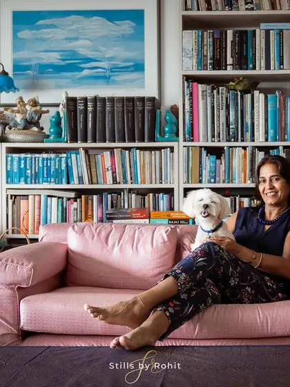 I was so honored to photograph in this beautiful home, filled with books, art, and decades of stories. It provided the perfect, personal backdrop for a portrait of a woman and her beloved dog.