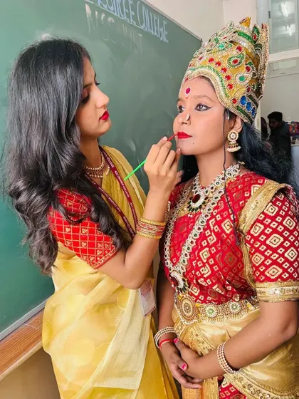 Attention to detail is key. Here, I am ensuring the lip color is perfectly applied for a goddess character, creating a look that is both beautiful and powerful for her performance.