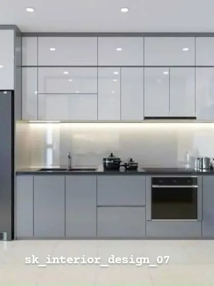 A sleek kitchen in shades of grey with glossy white upper cabinets. The layout is designed for maximum efficiency, with the refrigerator, sink, and oven in a practical work triangle.