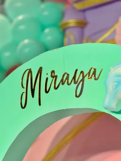 From a pastel soft play area and a cotton candy cart to a buffet with an LED screen backdrop showing aquatic life, every element was designed to immerse guests in Miraya's mermaid world.