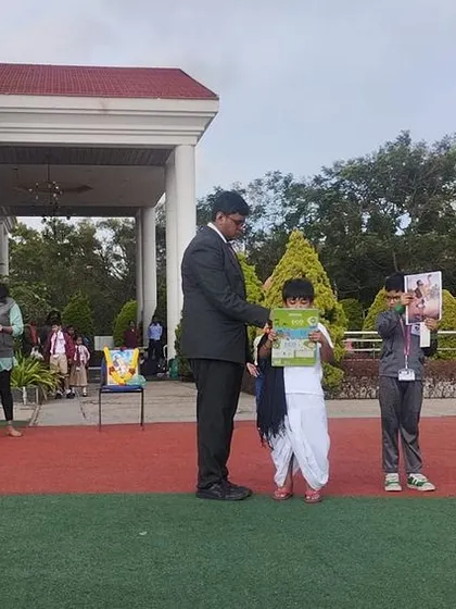 The Kanakadasa Jayanti assembly continues outdoors, where students share his philosophy with the entire school.