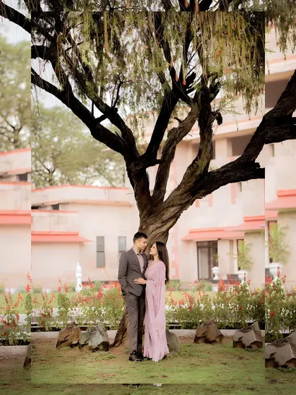 An artistic, mirrored shot of the couple under a tree, adding a creative and unique visual element to their pre-wedding collection.