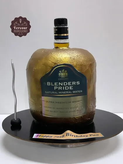This Blenders Pride bottle cake has a fun secret: there's a real miniature bottle hidden inside for the birthday person to enjoy. The outer shell is a delicious chocolate mousse cake.