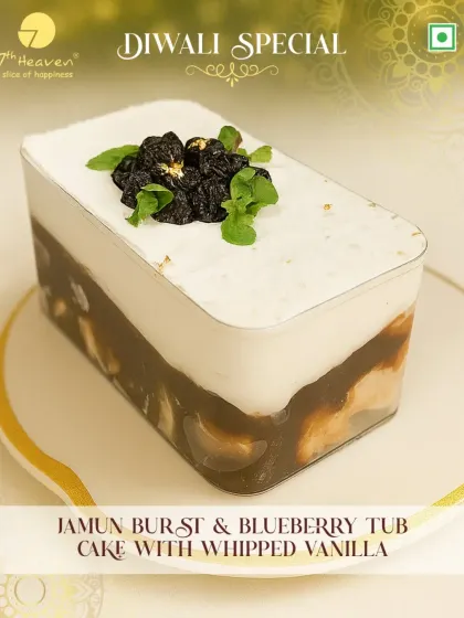 Light up your Diwali with our Jamun Burst & Blueberry Tub Cake. This unique dessert features layers of jamun and blueberry, topped with whipped vanilla.