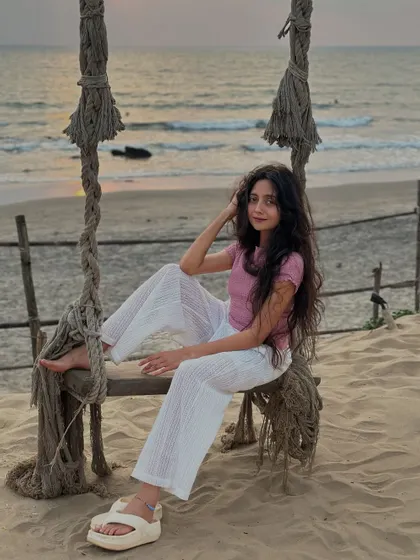 Relaxing on a rustic beach swing as the day ends. Finding these simple, beautiful spots is a key part of our travel itinerary.