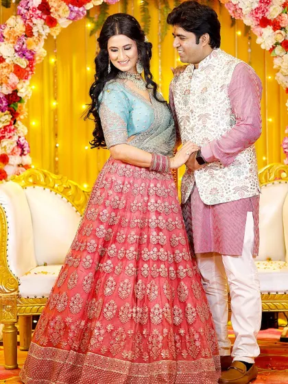 A sweet, interactive pose where the couple shares a look and a smile. These photos highlight the connection and happiness of the day.
