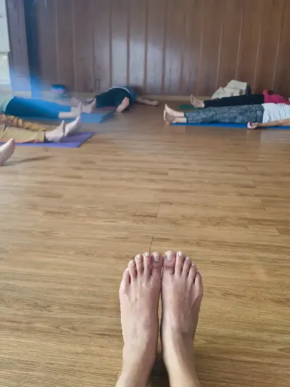 This weekend, move into a deep state of rest. This photo, taken from my perspective in Savasana, shows my students completely relaxed. This simple pose is powerful for recharging the nervous system.