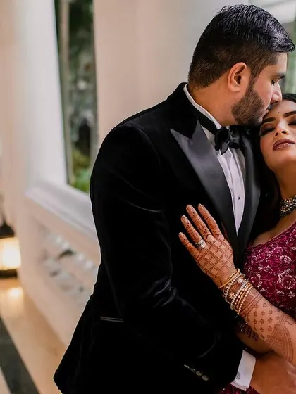 A stunning reception look at the Taj Westend. We use dramatic lighting and elegant backdrops to create sophisticated and timeless portraits for your evening events.