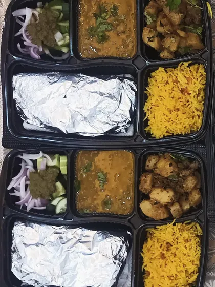 This thali features Arbi Masala and a simple dal, served with yellow rice and rotis. I use fresh spices to make even simple vegetables taste delicious.