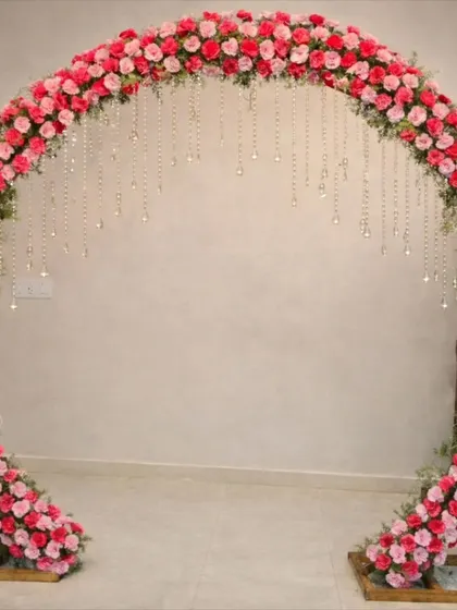 This stunning circular arch, densely packed with pink and red roses and accented with hanging crystals, creates a breathtaking frame for any event. It’s a perfect choice for engagements, anniversaries, or any celebration needing a touch of romance.