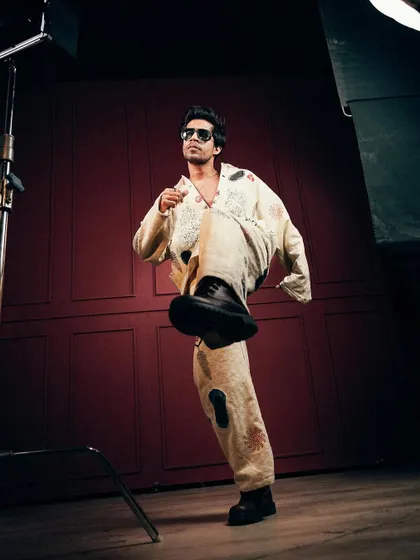 An action shot that brings energy and movement to a men's fashion portfolio.