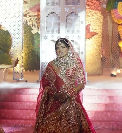 For this bridal entry leading to the jaimala, I designed a regal concept with dancers and large, artistic props inspired by traditional Indian culture, creating a path for the bride to make her grand entrance.