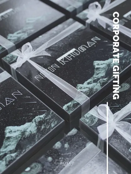 A uniquely designed corporate gift box for Nitin Khuman. The custom graphic print and delicate ribbon show how we can tailor every aspect of the hamper to match your brand's specific aesthetic.